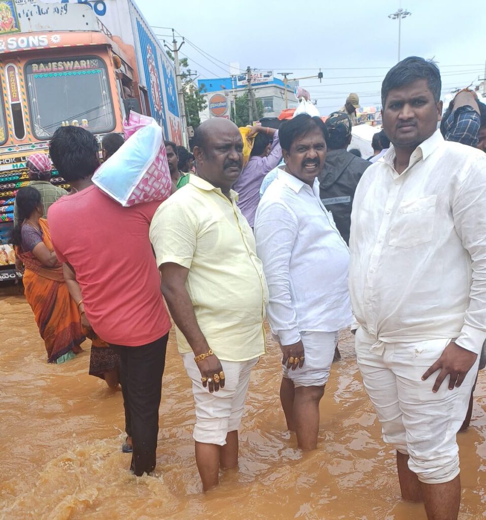 Flood Relief Efforts by Kashi Naveen and Majji Rambabu